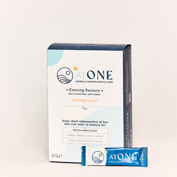 Box and packet of AtOne Evening Restore supplement on a white background
